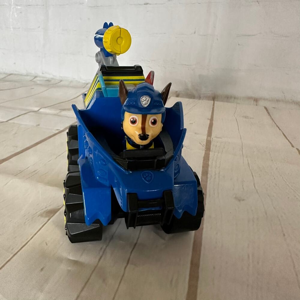Preowned Paw Patrol Dino Rescue Chase’s Deluxe Rev Up Vehicle